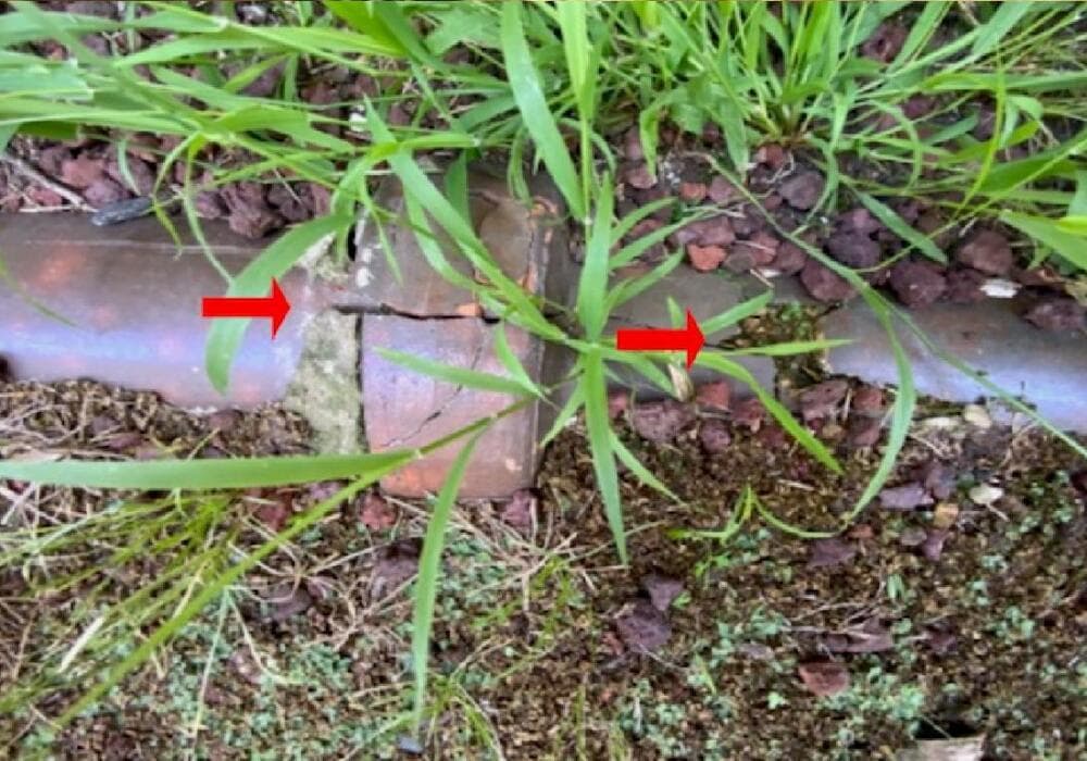 Cracked clay pipe causing subfloor moisture